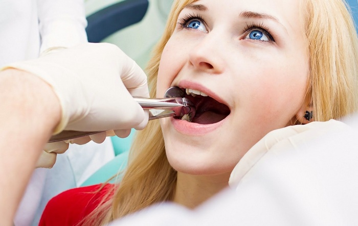 удаление зуба у стоматолога